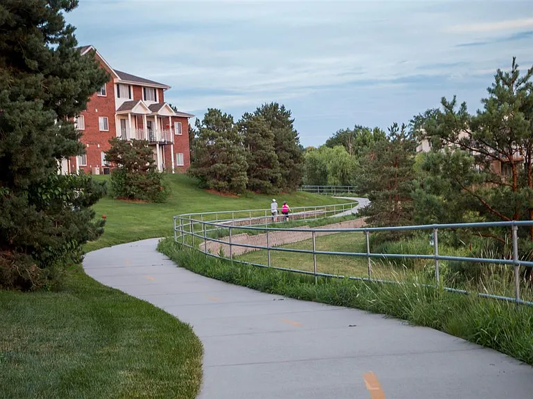 Enjoy scenic walking and biking trails just steps from your home, perfect for outdoor recreation and peaceful strolls.