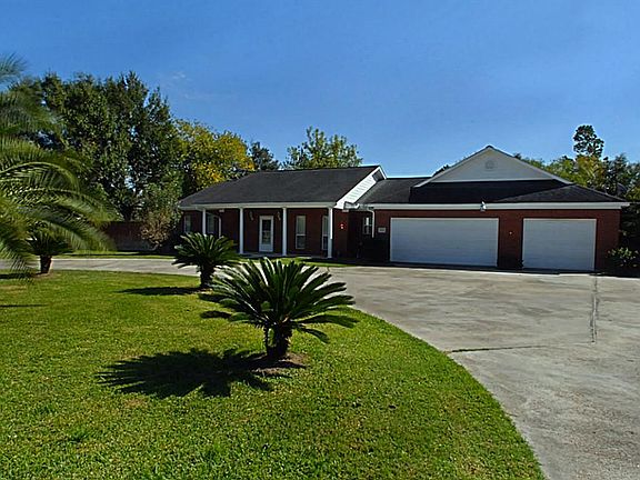 The home is located on a corner lot and culdesac street.  The circle driveway allows for additional parking and 2 entrances for convenience.  The 3 car garage is "finished out" and additionally has a sink, toilet, and water softener.