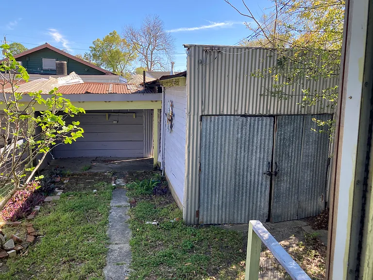 Backyard area & shed with laundry