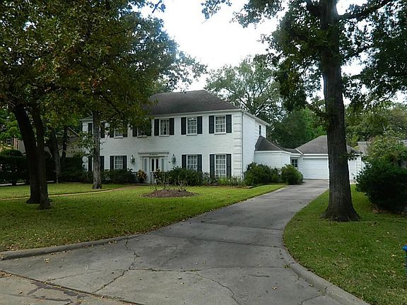 Long Driveway Leading to Detached Garage