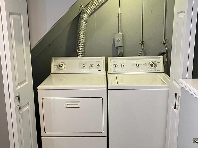 Laundry clost inside lower level bath