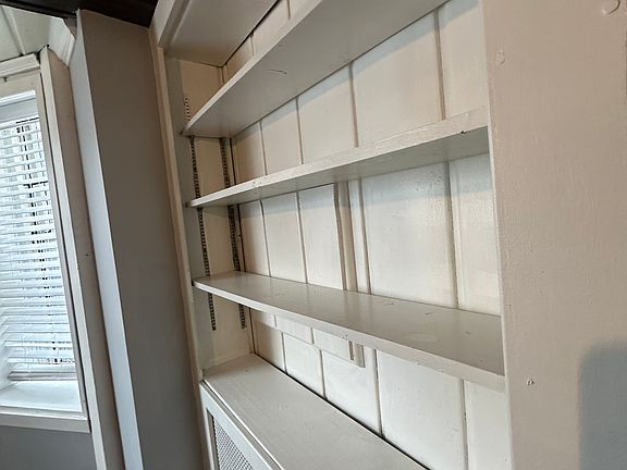 Shelves above radiator heat.