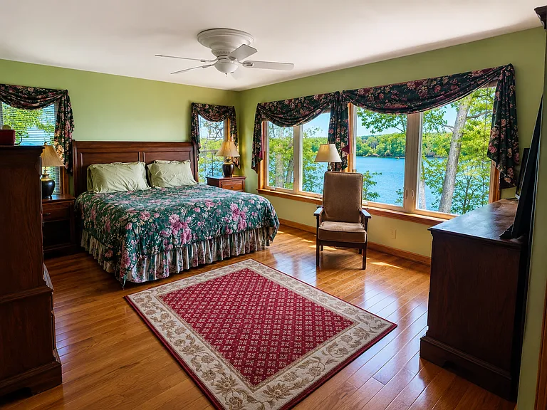 king bed with river views