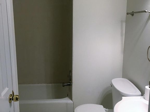 1st Bathroom tub shower combo with linen closet
