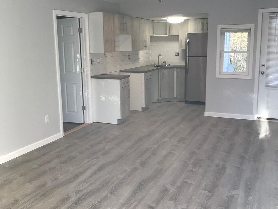 Kitchen with door to small deck