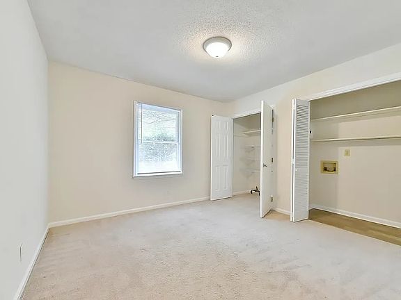 Back bedroom. These closets now contain a washer and dryer
