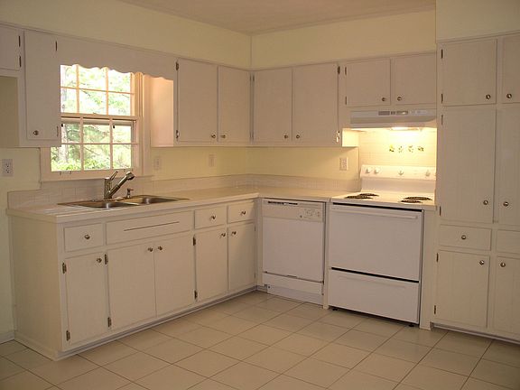 New tile countertops, floors and appliances.