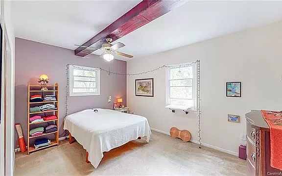 Bedroom - furnished. I feel like this picture makes it look a bit bigger than it actually is. Both bedrooms have a small closet.