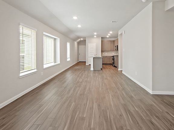 Family Room to Dining Area and Kitchen