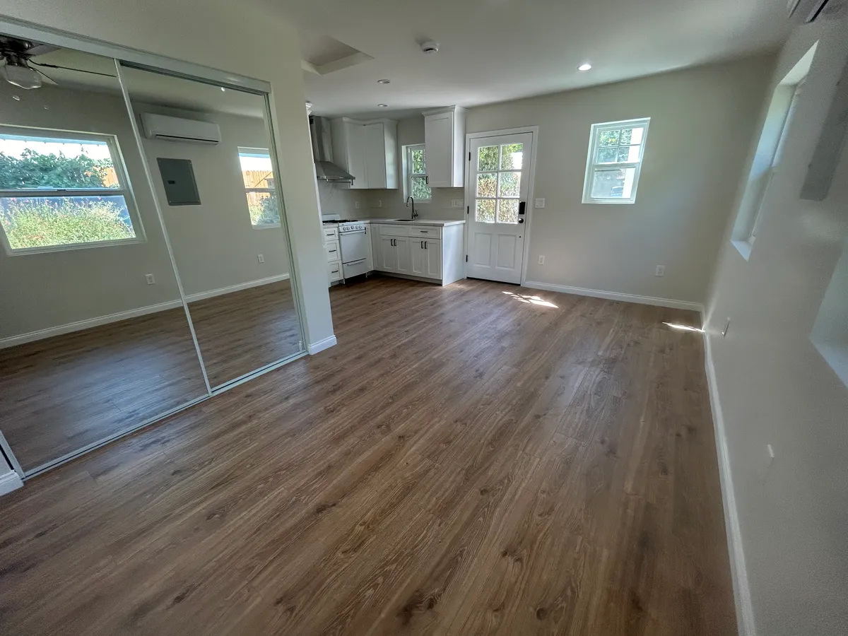 The bedroom area has a spacious full-size mirrored closet. - 3328 Fair Oaks Ave