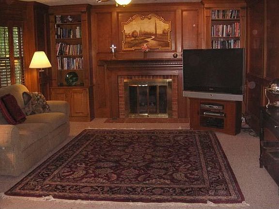 Very Spacious and Inviting Family Room with wall of windows and built-ins