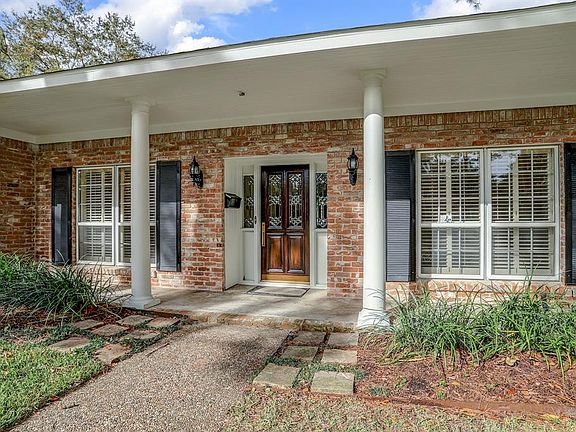 The columned front porch and black shutters welcome you to this 3 Bedroom, 2.5 bath home.