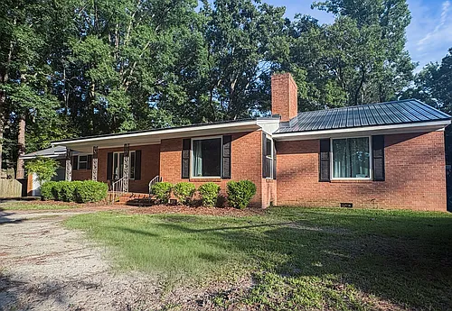 909 SE Greenville Blvd Photo 1