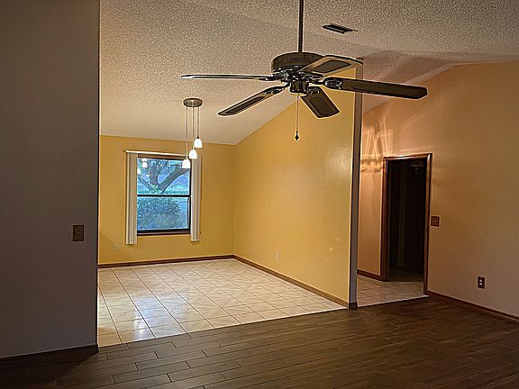 Dining room and entry (there is the pocket door!) from living room