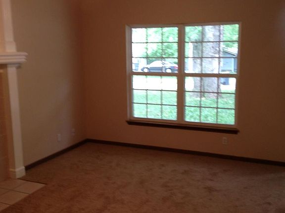 Large living room with beautiful windows