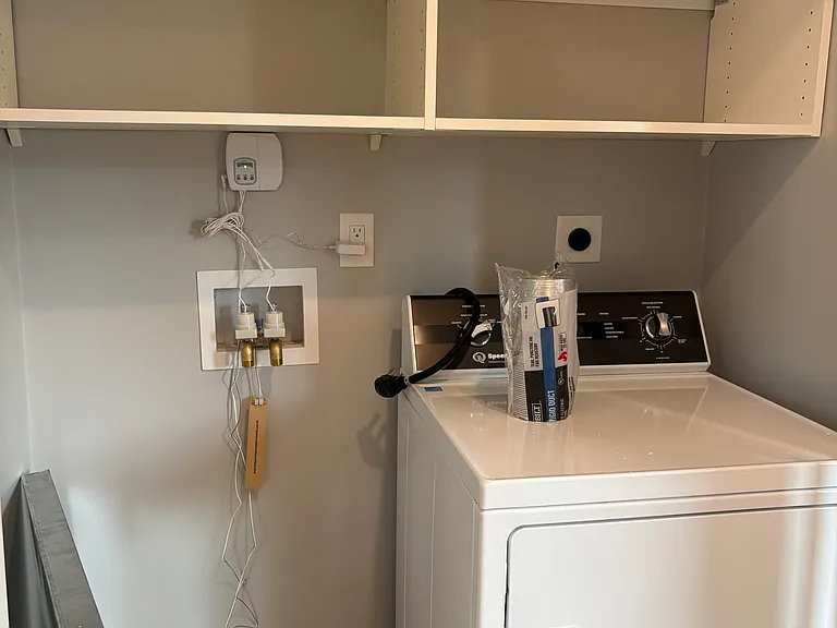 In Unit Laundry. Washer machine is back ordered. Should be installed by mid August. Brand new Speed Queen washer and dryer, new plumbing and electrical, new sheetrock, new hardwood floors, and new shelfs.