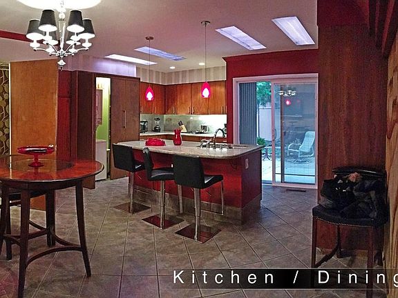 Hydrolic leather Bar Stools, Neon Recessed Lighting, Laundry