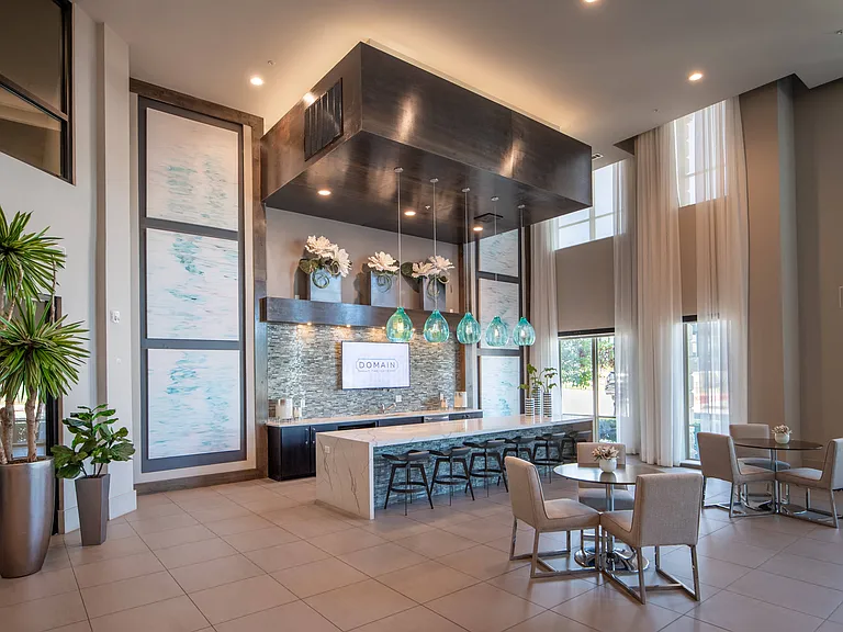 Lobby with Coffee Station, Pendant Lights, and Lounge Tables