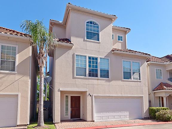STUCCO EXTERIOR AND TILE ROOF