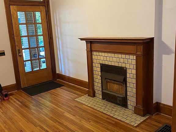 15 Light (Window) Door, Historic Fireplace with Tile Hearth.