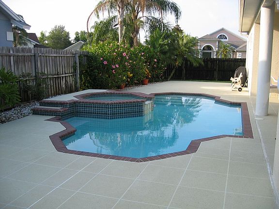 Heated Pool/Spa with large patio and backyard!