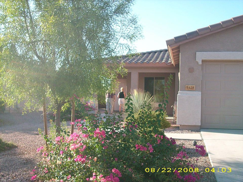 Front of the house in sunshine
