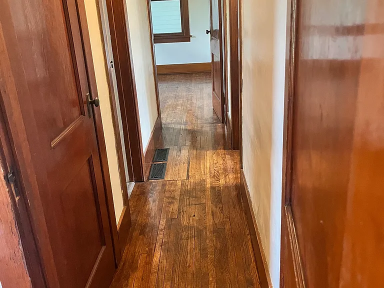 hallway between bedroom 1 and 2, bathroom access