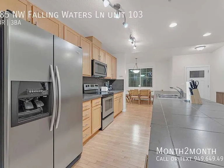 685 NW Falling Waters Ln #103 — Photo 12
