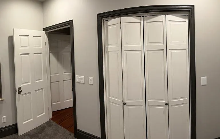 2nd Bedroom. Behind accordion doors is a standard closet.