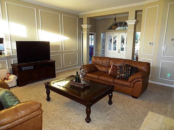 Kitchen opens to den.
