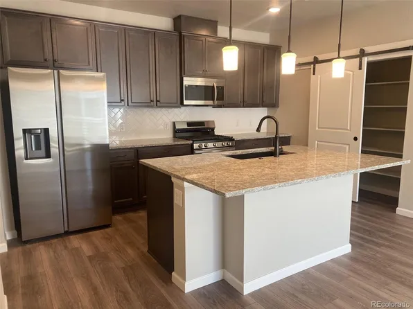 6153 N Ceylon Street Bldg 8 #305, Denver, CO 80249
