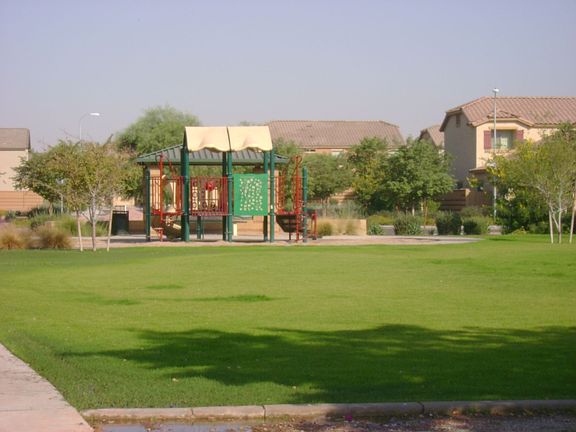 Tot lots and walking paths nearby!