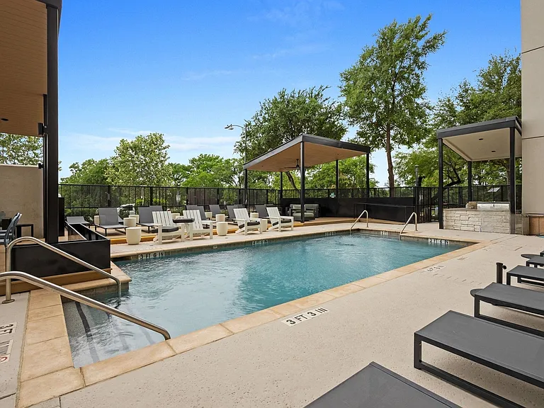 Cool off and connect with neighbors in your inviting poolside retreat.