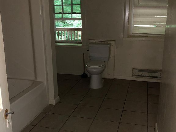 Very Large Bathroom, closet to left, shelving to right