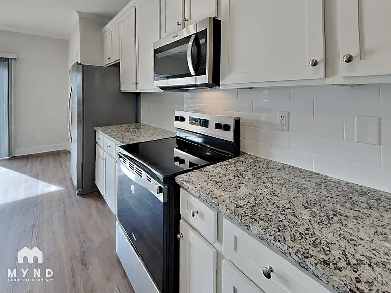 6933 Woodland Stream Pl — Photo 7