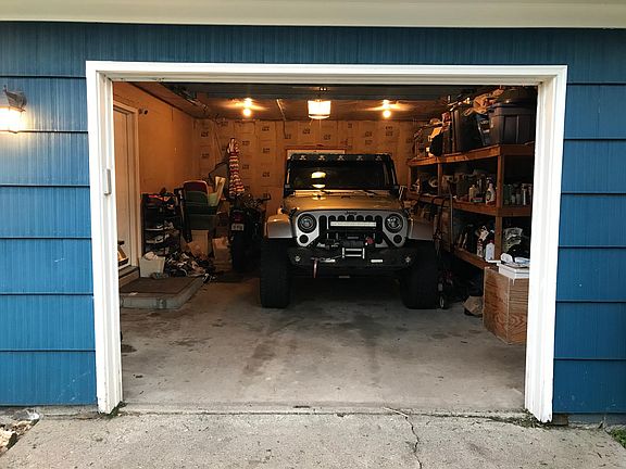 Oversized 1+ car garage with built in storage shelving