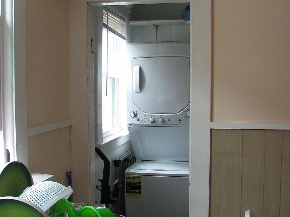 Newer washer dryer off eat in kitchen.