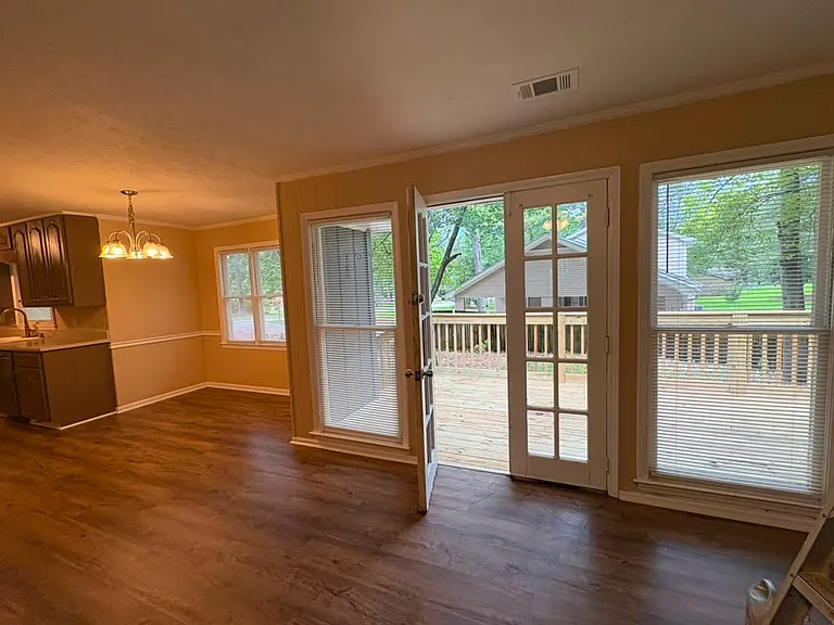 Lots of Windows leading to new Main Wooden Deck