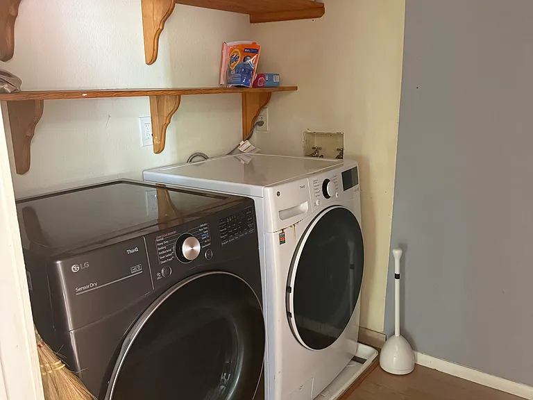 Laundry room with washer and dryer