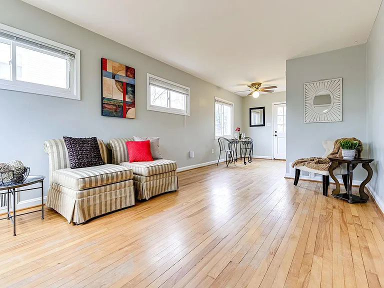 Hardwood floors now stained a darker color
