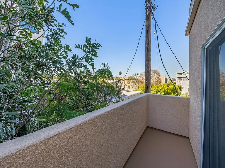 Newly upgraded master bedroom balcony--quiet and private with west facing view and spectacular sunsets.