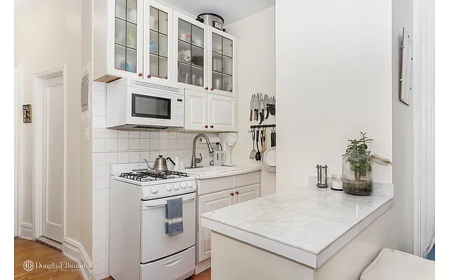 Sold by Douglas Elliman | media 10