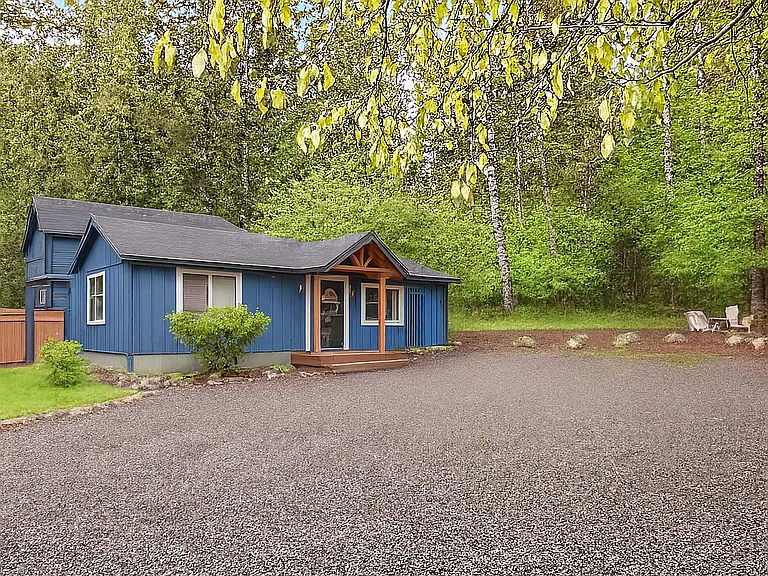 Welcome to your private retreat in the woods_ample parking, peaceful surroundings, and cozy cabin vibes await