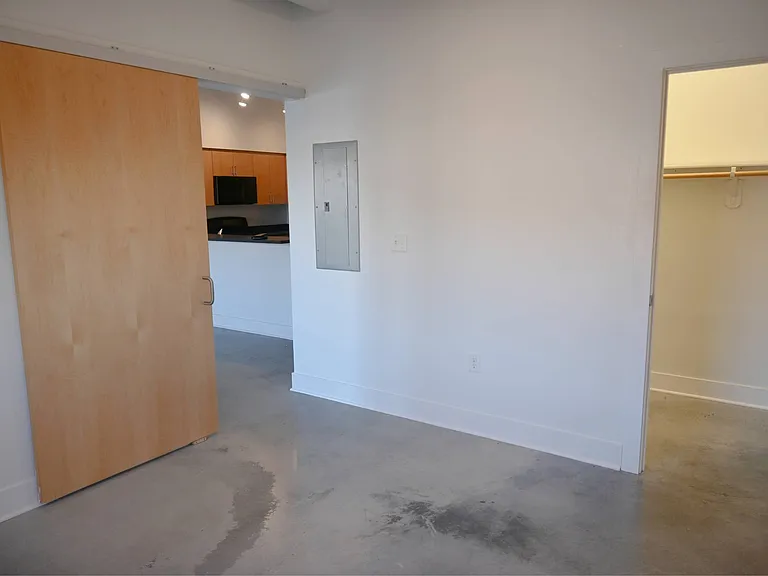 Bedroom with sliding door at The Sawyer.