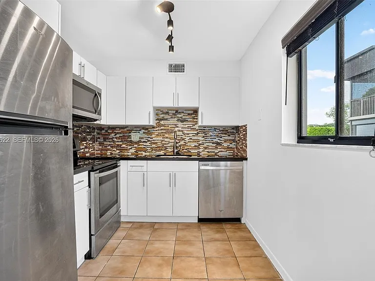 9920 NW 68th Pl #110 — Photo 11