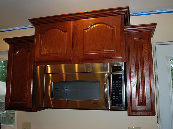 Microwave and spice rack (right cabinet)