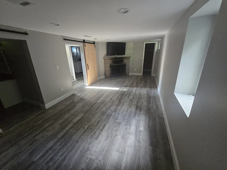 Spacious lower level that can be an owner's suite or second living room