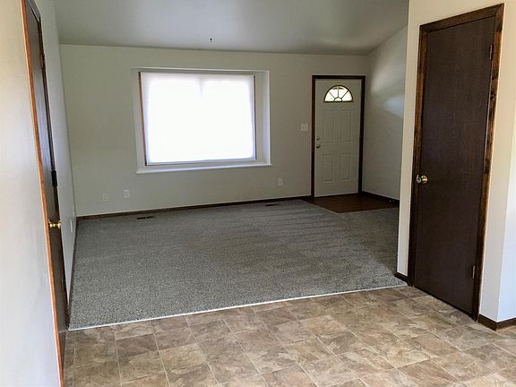 Updated carpet throughout. Photo of living room.