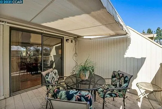 Back patio (new awning has been installed since this listing photo).