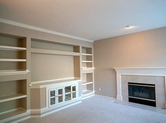 Built in TV shelf plus a gas fireplace